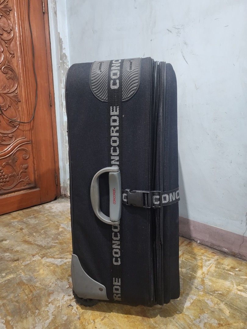 Concorde World Class Black Expandable Luggage (Category: Luggage) located in Malabon City. Submitted by grfpx (Listing ID 1462550226, Image 3). Description: - Concorde World Class luggage - Durable black fabric exterior - Expandable design for extra packing space - Retractable handle and smooth-rolling wheels for easy mobility - Built-in combination lock for security - Ideal for all your travel needs.