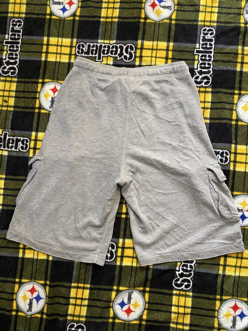 Converse All Star, Cargo sweat shorts (Category: Shorts) located in Cavite. Submitted by jc_thrift95 (Listing ID 1462582546, Image 2). Description: - a pair of grey fleece cargo sweatshorts featuring side cargo pockets and a Converse All Star logo patch near the upper left pocket. - Stretch, Garterized - 4 Pockets, - Made in Indonesia - Color rate 8/10 - See details picture for dimes. .