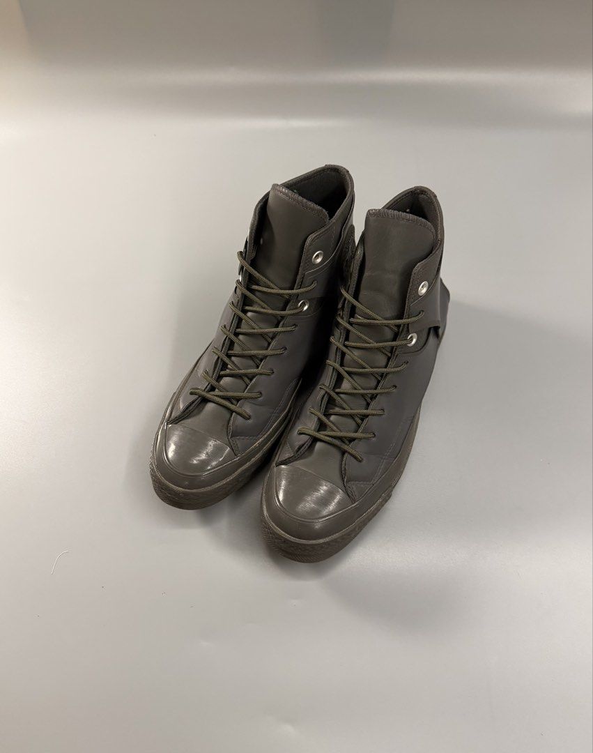 Converse Chuck 70 High Top Sneakers Dark Grey (Category: Sneakers) located in Quezon City. Submitted by markieexp (Listing ID 1462644133, Image 3). Description: - Dark grey Converse Chuck 70 high tops - Unique layered design - Matching dark green laces - Made in Vietnam - Size: 8.5 US Men's / 10.5 US Women's.