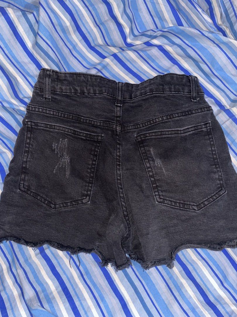Cotton On Black Denim Distressed Shorts (Category: Shorts) located in Makati City. Submitted by fashionangel.222 (Listing ID 1462638230, Image 2). Description: - Brand: Cotton On - Color: Black - Style: Mid-rise denim shorts - Features: Frayed hem, distressed detailing on pockets - Closure: Button and zip - Fits up to S.