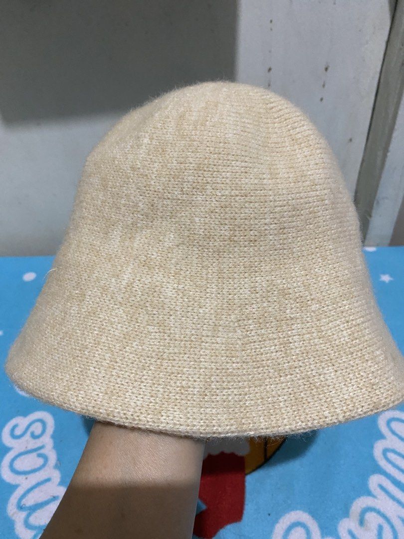 Cream Knit Bucket Hat (Category: Hats & Beanies) located in Manila. Submitted by resi.diaz (Listing ID 1462634962, Image 2). Description: - Cream knit bucket hat - Simple and classic design - Soft material for a comfortable fit - Versatile color, matches everything - Ideal for everyday wear, sunny days, or a casual look.