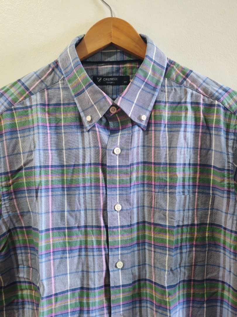 CREMEUX Short Sleeve Plaid Button Down Shirt (Category: Formal Shirts) located in Cavite. Submitted by purelabels_alexandsofia (Listing ID 1462451827, Image 2). Description: - CREMEUX short sleeve button down shirt - Classic blue, green, and pink plaid pattern -Size shoulder to shoulder 19 inches/28.5 length -Size on tag Large -used like new - no flaws - Features a button collar - Versatile for casual or slightly dressed-up looks.