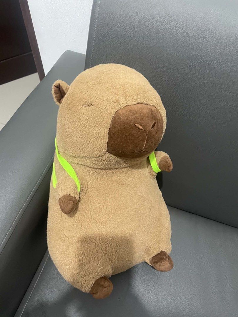 Cute Capybara Plush Toy with Turtle Backpack (Category: Plushies & Soft Toys) located in Manila. Submitted by kenakeza (Listing ID 1462496313, Image 1). Description: -Bought for 6 hundred - Super soft and cuddly capybara plush - Adorable green turtle backpack attached - Ideal for kids or as a cute desk decoration - Clean and well-maintained condition.