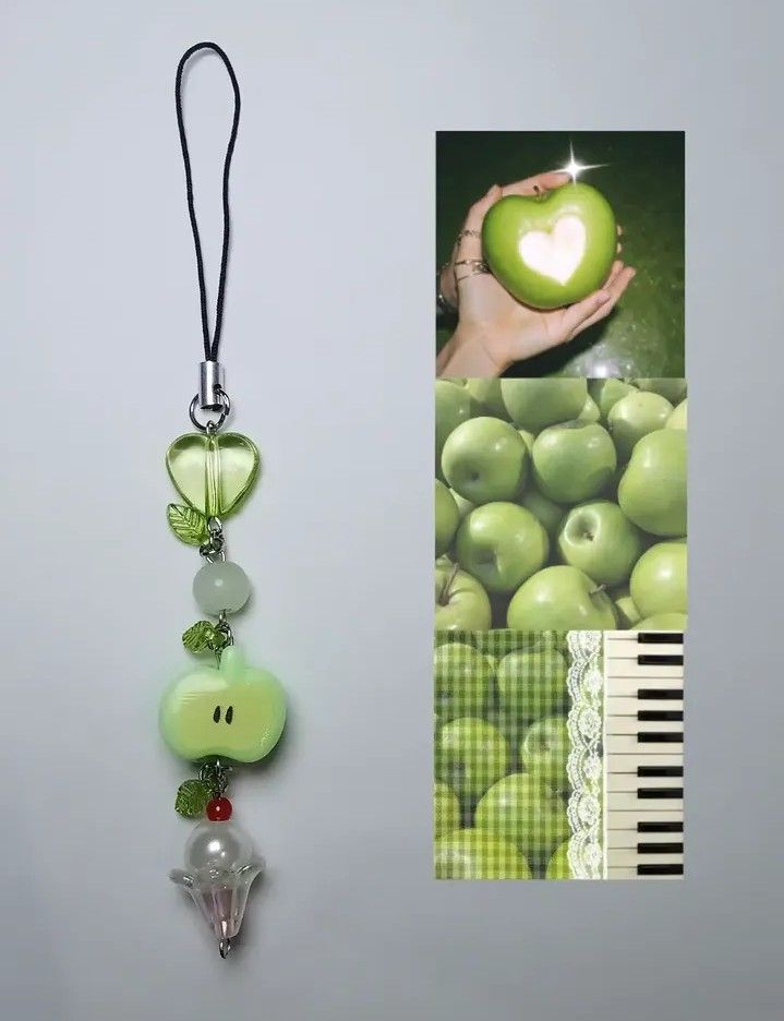 Cute Green Apple & Heart Charm Keychain (Category: Charms) located in Pangil. Submitted by dear_solace_trinkets (Listing ID 1462440293, Image 1). Description: - Cute keychain charm with apple and heart details. - Features pastel green apple charms. - Includes a heart charm. - Green - Comes with a pearl flower charm. - Has a loop for easy attachment to keys, bags, or phones. - Adds a pop of color and personality to your accessories. - Juminocore.