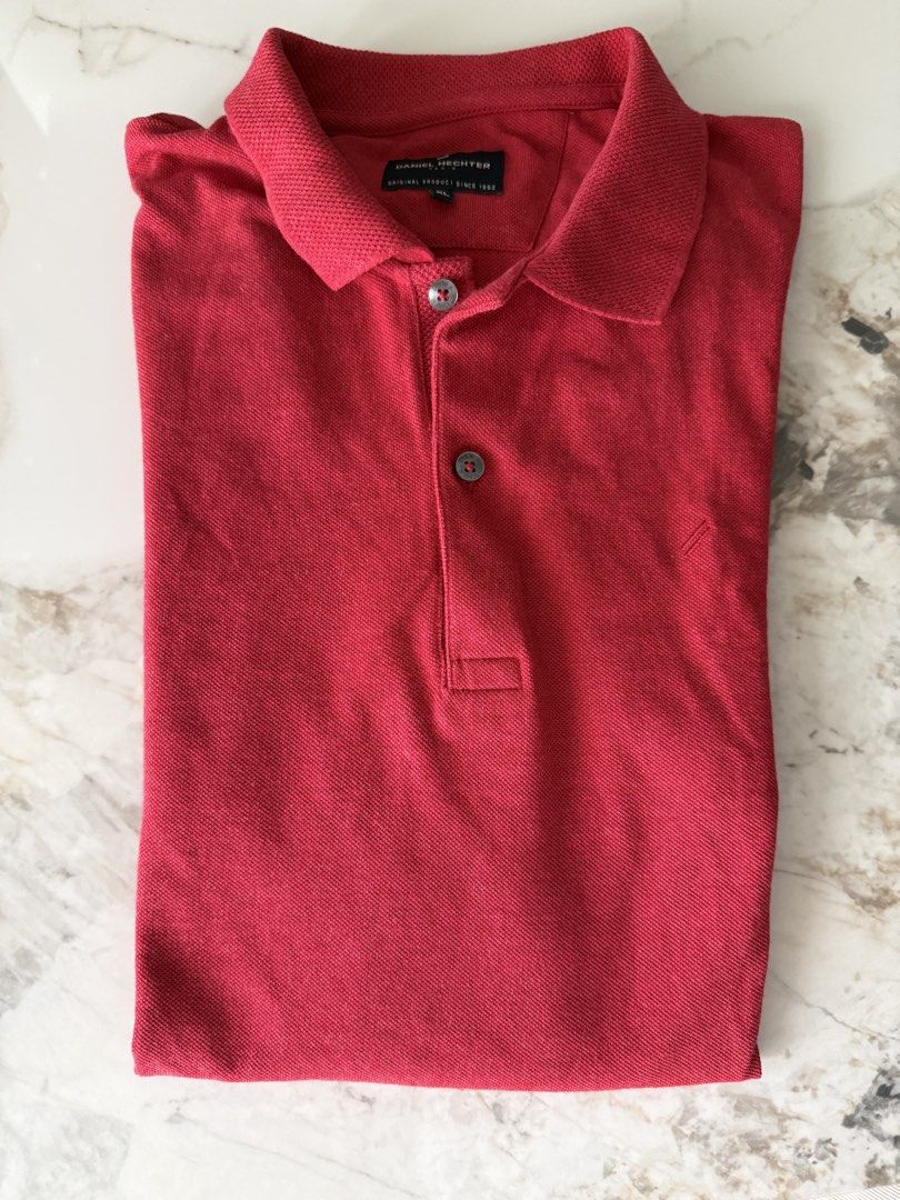 Daniel Hechter Red Polo Shirt (Category: Tshirts & Polo Shirts ) located in Manila. Submitted by heatsneakerstoreph (Listing ID 1462497060, Image 1). Description: Almost Brand New Fitted only 11/10 Condition Size XL RFS: Decluttering .
