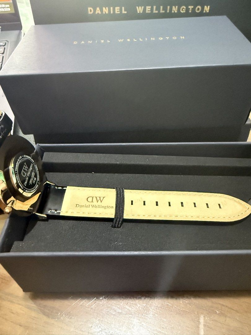 DANIEL WELLINGTON WATCH 40mm (Category: Men's Watches) located in Paranaque City. Submitted by lulusthreadsandthings (Listing ID 1462651714, Image 3). Description: ⌚ AUTHENTIC DANIEL WELLINGTON CLASSIC 40MM — ROSE GOLD Selling Daniel Wellington Classic Sheffield 40mm, model B40R1 / DW00100009. 🤍 White/Eggshell dial 🌹 Rose-gold-tone case 🖤 Genuine black leather strap 📦 Original Daniel Wellington box included ✨ Classic minimalist design 🔋 Quar