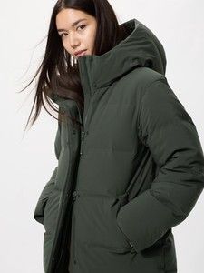 Dark Green Hooded Puffer Jacket (Category: Coats, Jackets and Outerwear) located in Lucena. Submitted by silvershark.1fa28c (Listing ID 1462445330, Image 1). Description: - Used once in Mt. Pulag - Super warm puffer jacket - Dark green color - Features a hood - Front pockets - Perfect for cold weather - Cozy and stylish design - Ideal for everyday wear.