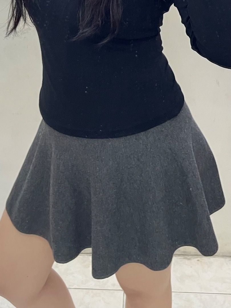 Dark Grey Flared Mini Skirt (Category: Skirts) located in Santa Rosa. Submitted by rsxyen (Listing ID 1462600540, Image 1). Description: - Flared mini skirt - Dark grey color - Stretchy knit waistband - Versatile for casual or dressy occasions - Easy to pair with various tops.
