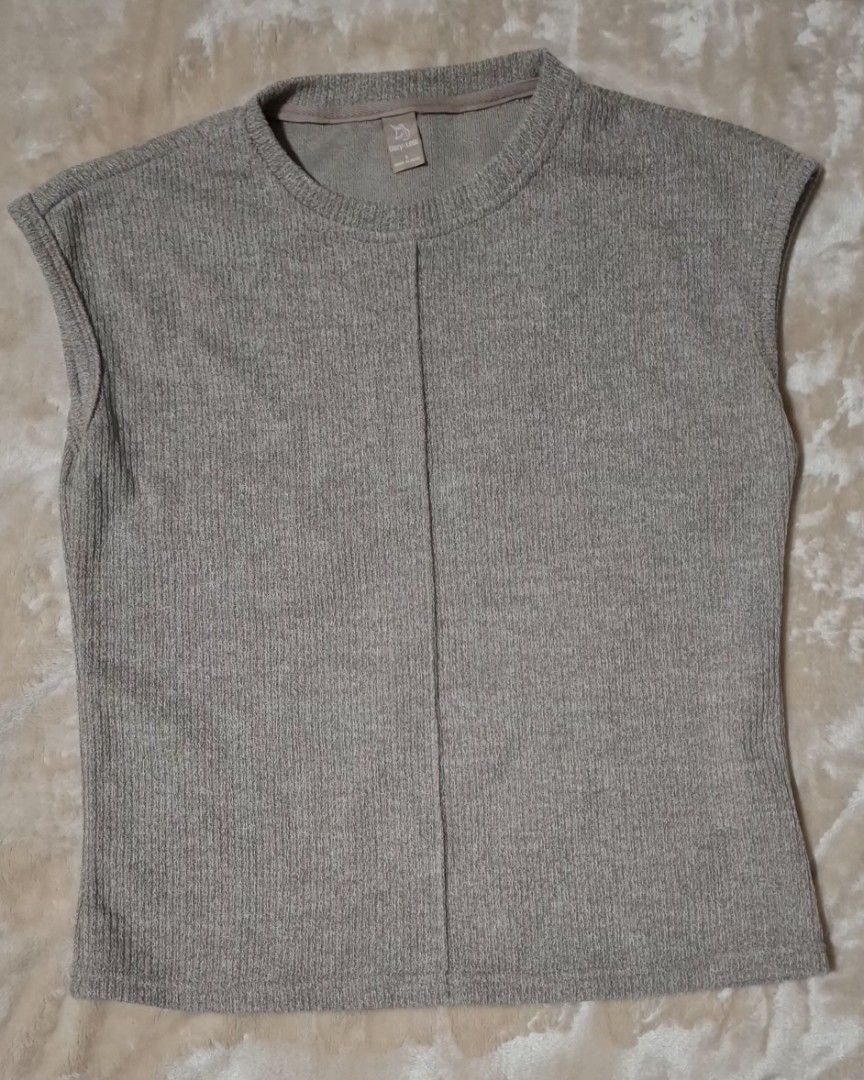 DAZY LESS Light Brown Knitted Top (Category: Sleeveless) located in Quezon City. Submitted by MP_Declutters (Listing ID 1462572049, Image 1). Description: Brand new and never used DAZY LESS knitted top in light brown/taupe. Simple and classy design, easy to pair with pants, jeans, or a skirt. No issues. Selling price: ₱150.