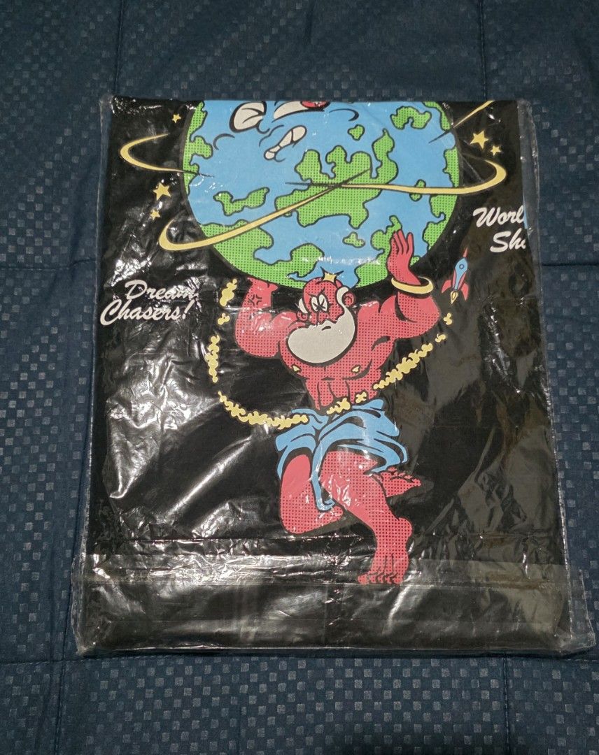 DBTK "World Shakers" Graphic Tee (Category: Tshirts & Polo Shirts ) located in Santa Rosa. Submitted by wel3993 (Listing ID 1462480097, Image 1). Description: Dbtk Black Large Regfit w/sticker Brandnew 💸900 MOD. LBC MOP. BDO, GCASH LOC. NUEVA ECIJA - Black DBTK t-shirt - Features 'World Shakers' graphic with Atlas holding the Earth - Text includes 'Dream Chasers!' and 'World Shakers!' - Made from comfortable fabric - Ideal for casual wear - Plea