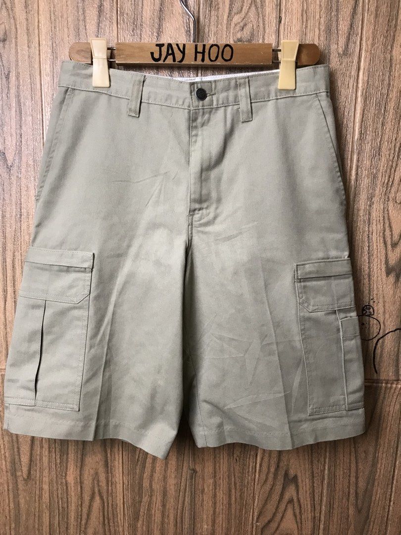 Dickies Cargo Shorts Khaki Size 30 (Category: Shorts) located in Aloguinsan. Submitted by jayhooukay (Listing ID 1462584675, Image 2). Description: - Brand: Dickies - Style: Cargo Shorts - Color: Khaki - Size: 30 waist - Material: 65% Polyester, 35% Cotton - Origin: Made in Guatemala - Features: Durable, multiple pockets - Care: Machine wash warm, tumble dry low - Ideal for: Everyday wear, work, outdoor activities.