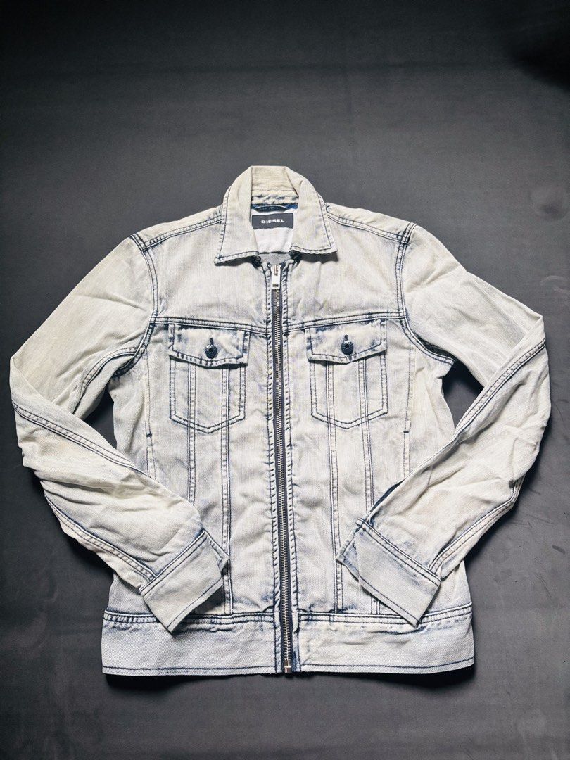 Diesel Denim Jacket - Washed Blue (Category: Coats, Jackets and Outerwear) located in Manila. Submitted by erxm.thrift (Listing ID 1462571335, Image 1). Description: - Cool Diesel denim jacket - Washed blue color - Zip-up front closure - Two chest pockets with button closures - Ideal for casual wear.
