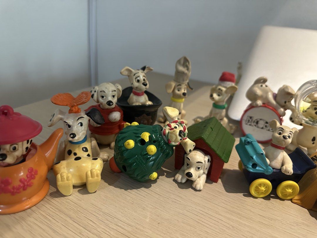 Disney 101 Dalmatians Figurines Set (Category: Figurines & Statues) located in Manila. Submitted by amazingamie8 (Listing ID 1462472233, Image 2). Description: - Collection of 101 Dalmatians figurines - Includes various characters - Comes with accessories: car, house, and Christmas tree - Perfect for collectors or fans of the movie - Some pieces show minor paint wear - Selling as a complete lot.