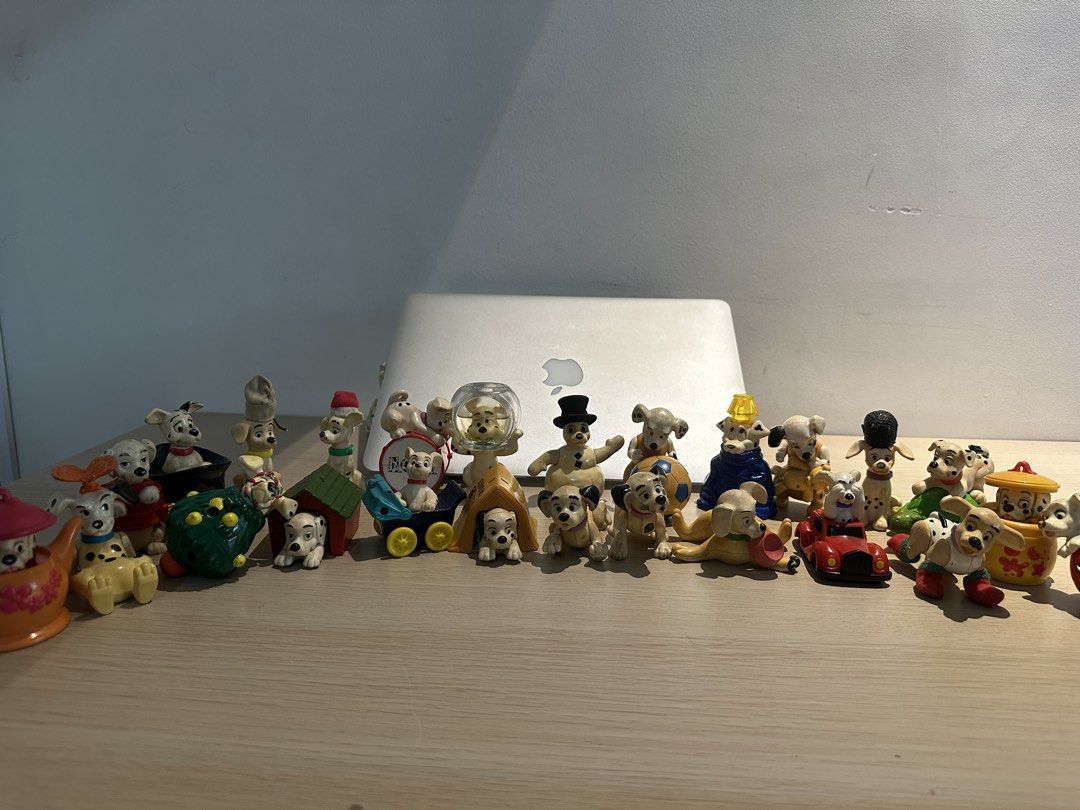 Disney 101 Dalmatians Figurines Set (Category: Figurines & Statues) located in Manila. Submitted by amazingamie8 (Listing ID 1462472233, Image 1). Description: - Collection of 101 Dalmatians figurines - Includes various characters - Comes with accessories: car, house, and Christmas tree - Perfect for collectors or fans of the movie - Some pieces show minor paint wear - Selling as a complete lot.