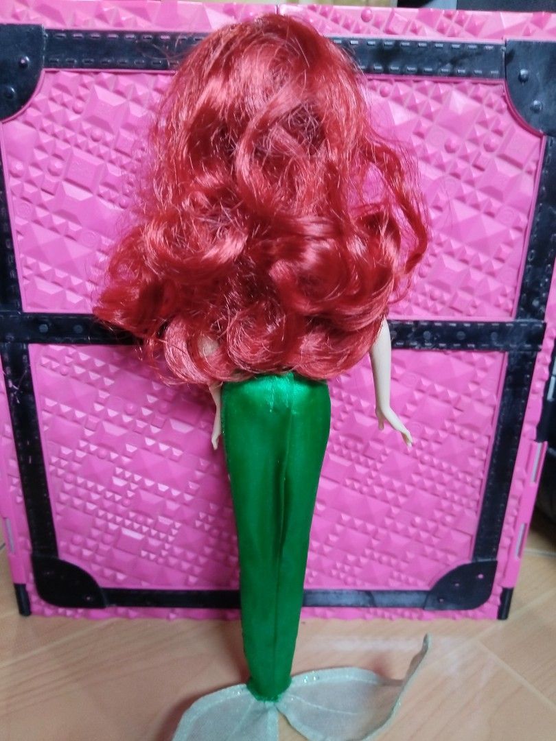 Disney Parks Ariel (Category: Figurines & Statues) located in Goa. Submitted by liz1104 (Listing ID 1462506234, Image 3). Description: Authentic Disney Parks produced doll. Rubber legged no bitemarks no cracked neck no penmarks no broken limbs nor glued parts missing purple seashell design on top. Gcash First to pay.