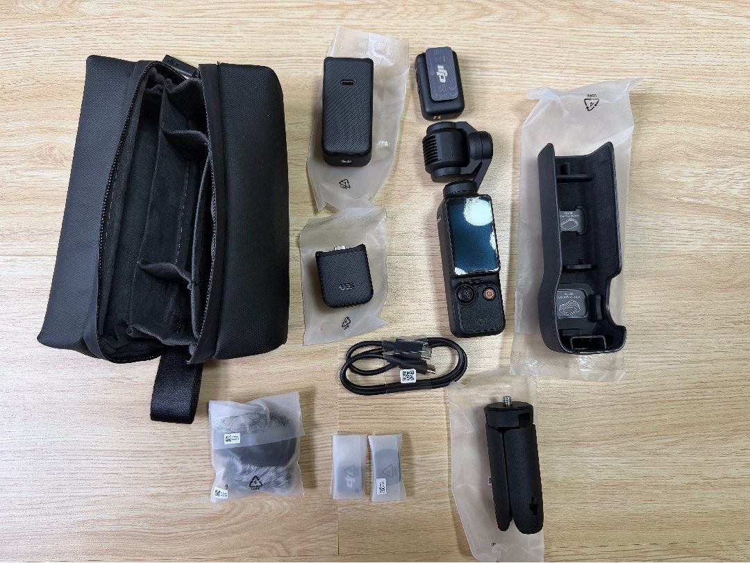 DJI Pocket 3 Creator Combo Gimbal Camera (Category: Cameras) located in Angeles City. Submitted by miku_i (Listing ID 1462644783, Image 1). Description: - DJI Pocket 3 Creator Combo - Includes camera and gimbal - Comes with charging case - Wide-angle lens included - Microphone for clear audio - Tripod for stable shots - Carrying bag for portability - All accessories shown are included - used twice only - no box and receipt.