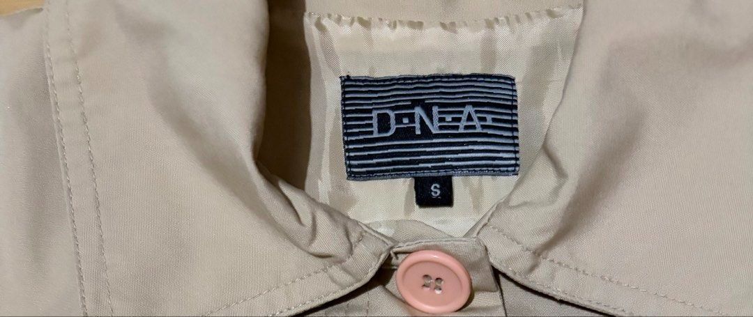 DNA Beige Dress / trech Coat Small - Medium (Category: Coats, Jackets and Outerwear) located in Quezon City. Submitted by garagesale2026 (Listing ID 1462454564, Image 3). Description: - Preloved - In very good condition - From Singapore - Runs big, S on tag, fits up to Medium - Waist: 31"; Sleeve: 22"; Length: 35.5"; Shoulder width: 15"; Underarm width: 18" - Classic button closure; Two front pockets with button details - Can be used as a dress o