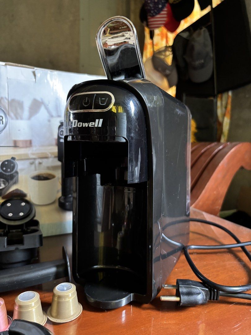 Dowell Espresso Multi-Capsule Machine (Category: Coffee Machines & Makers) located in Baguio. Submitted by pinkynj (Listing ID 1462521699, Image 3). Description: - Dowell Coffee Maker - Includes 3 capsule adapters for versatility - Powerful 20 bar pump pressure for rich espresso - 700ml detachable water tank - Comes with scoop and filter baskets - Original box and packaging included - Ready to make your perfect morning coffee - 5 free pods not su