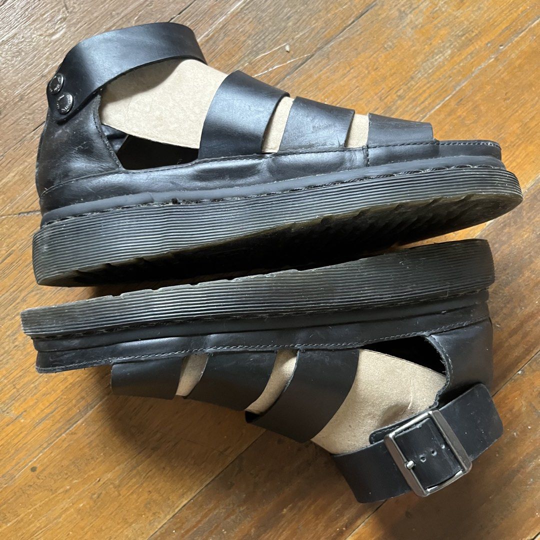 Dr. Martens Clarissa Black Leather Platform Gladiator Sandals (Category: Flats & Sandals) located in Manila. Submitted by msruiten (Listing ID 1462500816, Image 3). Description: - Dr. Martens black leather gladiator sandals - Platform sole for added height - Secure ankle buckle closure; black stitch instead of yellow - Iconic Dr. Martens air-cushioned sole - Got them here at Carousell for a higher price RFS: I don’t use them anymore .