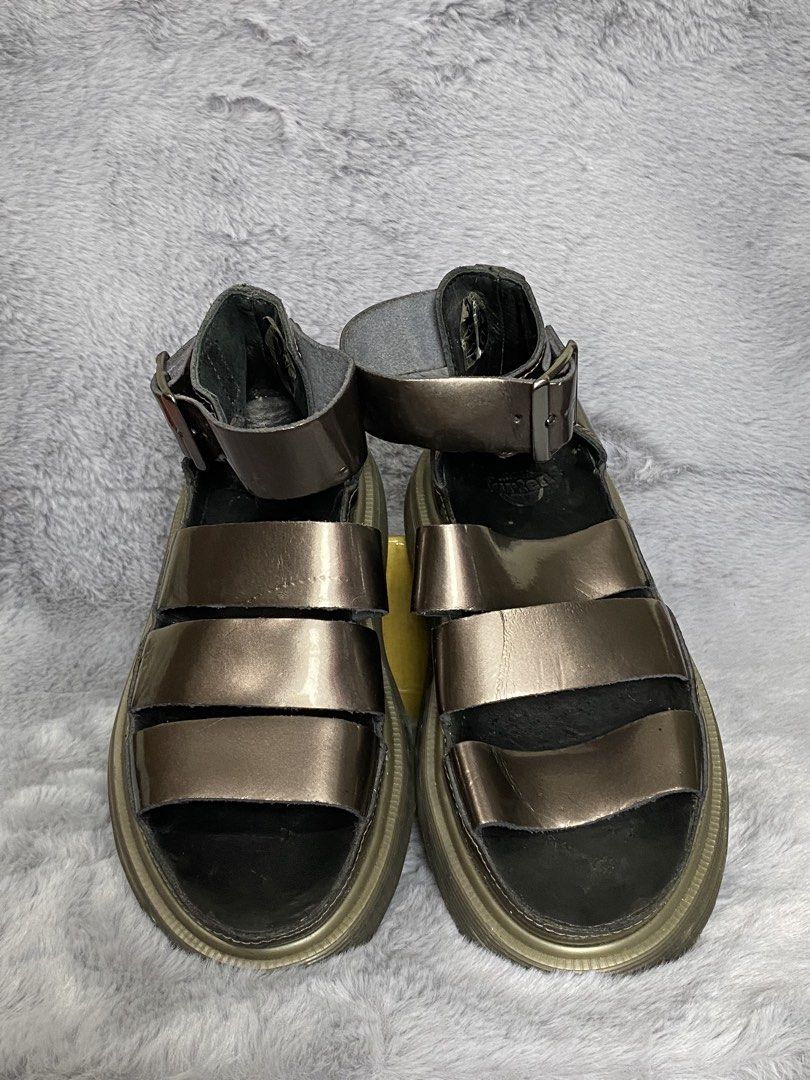 Dr. Martens Clarissa Sandals (Category: Sneakers & Footwear) located in Cebu City. Submitted by thrift_grail (Listing ID 1462659523, Image 1). Description: Excellent condition Sign of usage Metallic bronze color Size 36 eur Cebu city📍 .