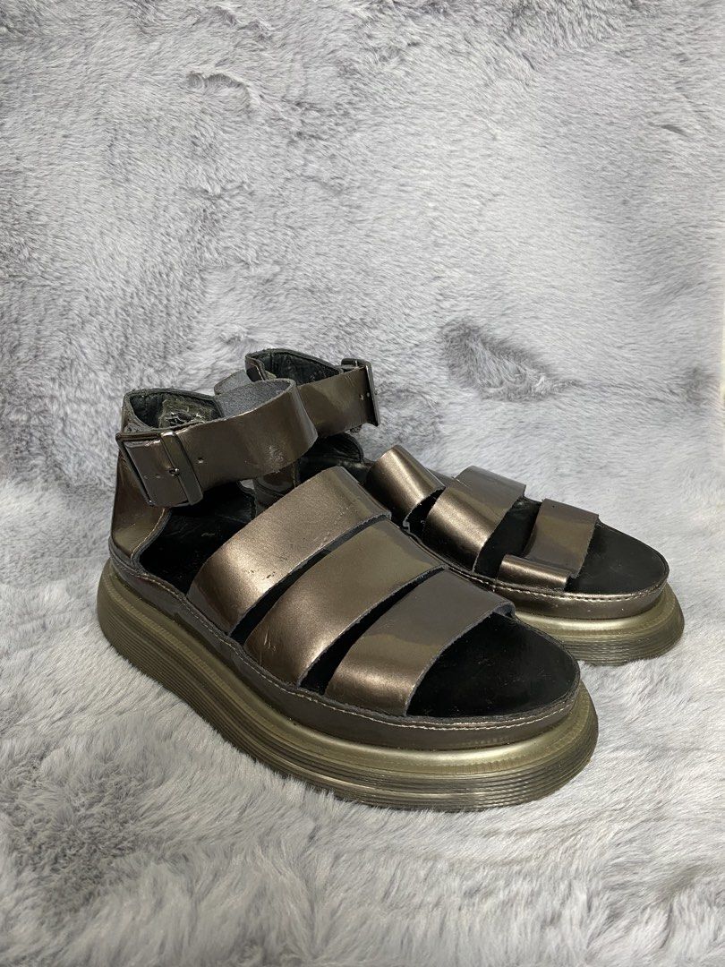 Dr. Martens Clarissa Sandals (Category: Sneakers & Footwear) located in Cebu City. Submitted by thrift_grail (Listing ID 1462659523, Image 2). Description: Excellent condition Sign of usage Metallic bronze color Size 36 eur Cebu city📍 .