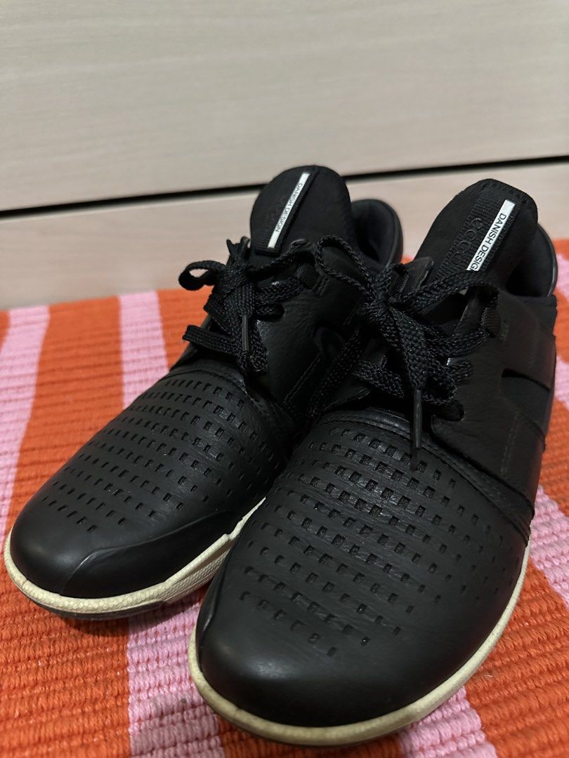 Ecco Black Leather Sneakers Size 8 (Category: Sneakers) located in Antipolo. Submitted by wxyz9876 (Listing ID 1462519898, Image 2). Description: - Black Ecco sneakers - Size 8 - Danish design - Perforated details on front and sides - White soles with signs of wear - Black laces - Price is negotiable.