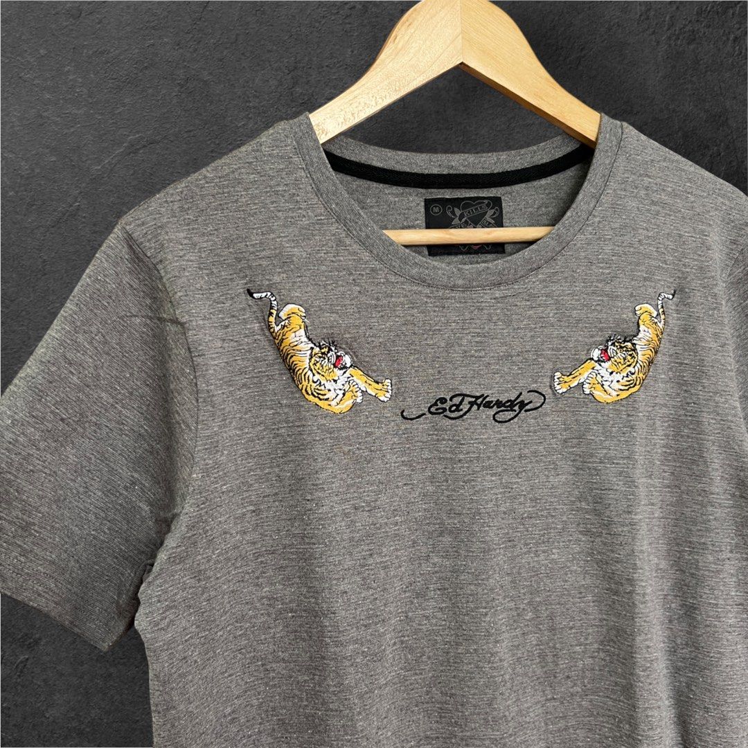 ED HARDY (Category: Tshirts & Polo Shirts ) located in Solano. Submitted by brokeboyzsupply (Listing ID 1462572228, Image 3). Description: Size: M Width: 19 Length: 28 Color rate: 10/10 Condition: 10/10 Issue/s: None - Missing hangtag “Color may vary due to lighting”.