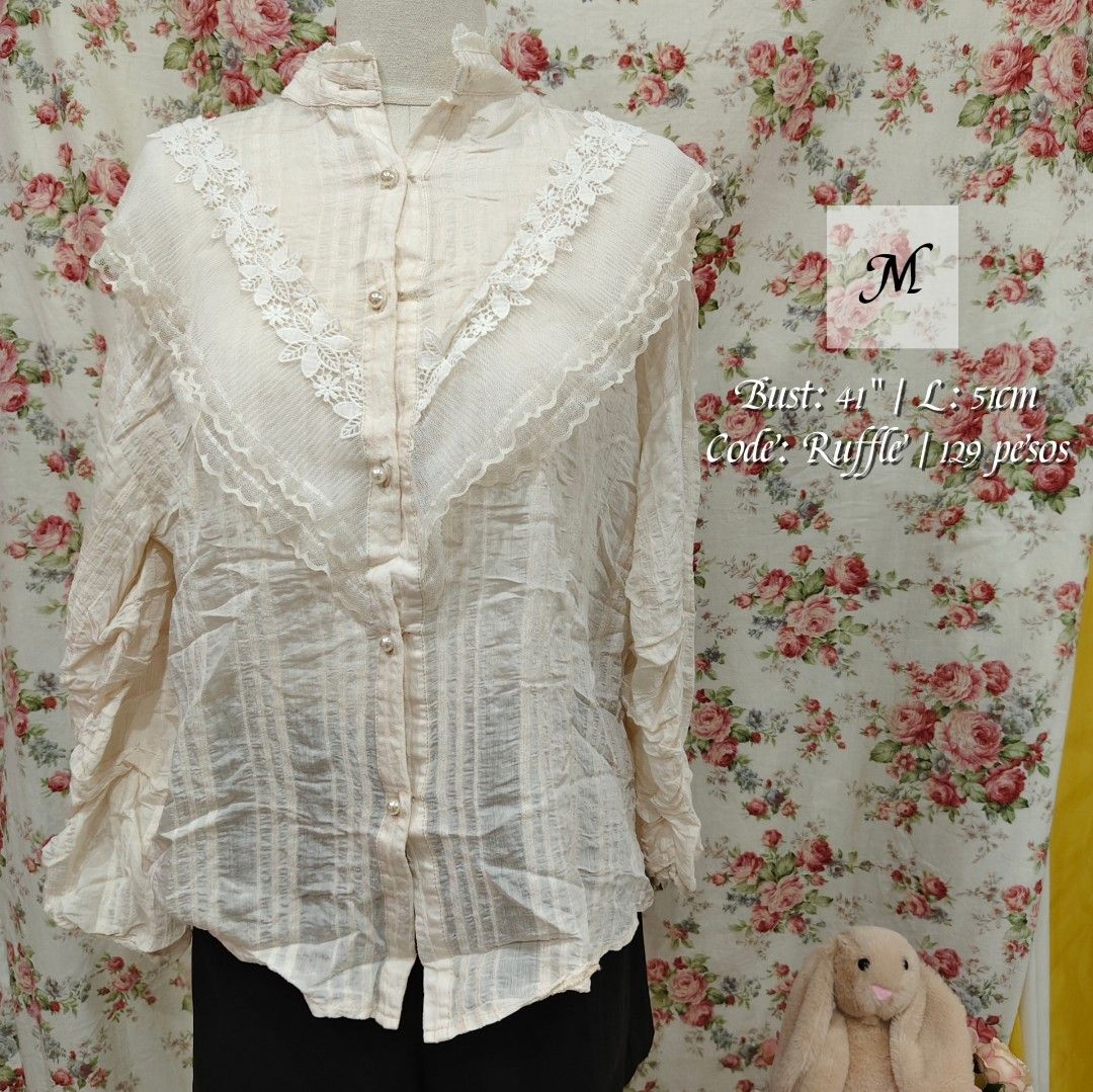 Elegant Beige Ruffle Blouse with Pearl Buttons (Category: Longsleeves) located in Cabanatuan. Submitted by curated_cozy (Listing ID 1462470359, Image 1). Description: Thrifted! Flaw: Missing Pearl Button Size: M Bust: 44" Length: 51cm -Lightly Washed -Payment thru Gcash, Gotyme, MariBank -Shipping via J&T -Buyer shoulders Shipping Fee ‼️No Rush Order‼️ [SKU: KNT4-B2 ].