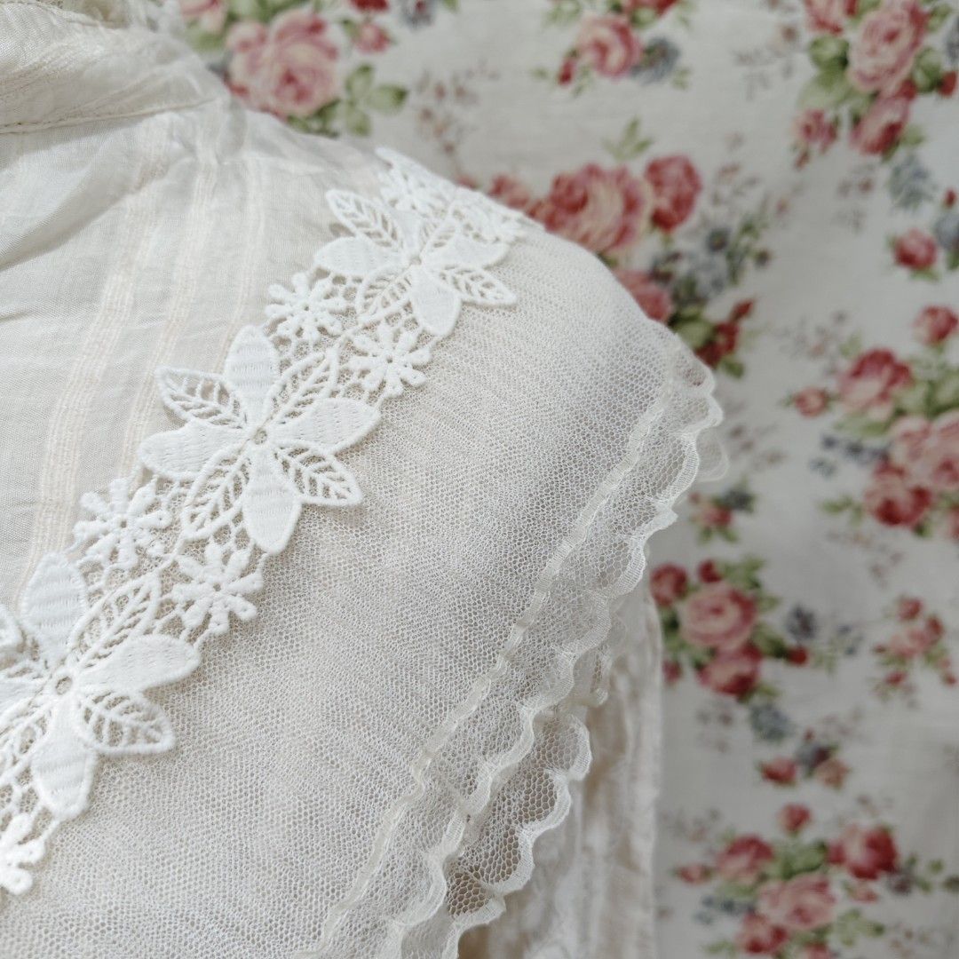 Elegant Beige Ruffle Blouse with Pearl Buttons (Category: Longsleeves) located in Cabanatuan. Submitted by curated_cozy (Listing ID 1462470359, Image 3). Description: Thrifted! Flaw: Missing Pearl Button Size: M Bust: 44" Length: 51cm -Lightly Washed -Payment thru Gcash, Gotyme, MariBank -Shipping via J&T -Buyer shoulders Shipping Fee ‼️No Rush Order‼️ [SKU: KNT4-B2 ].