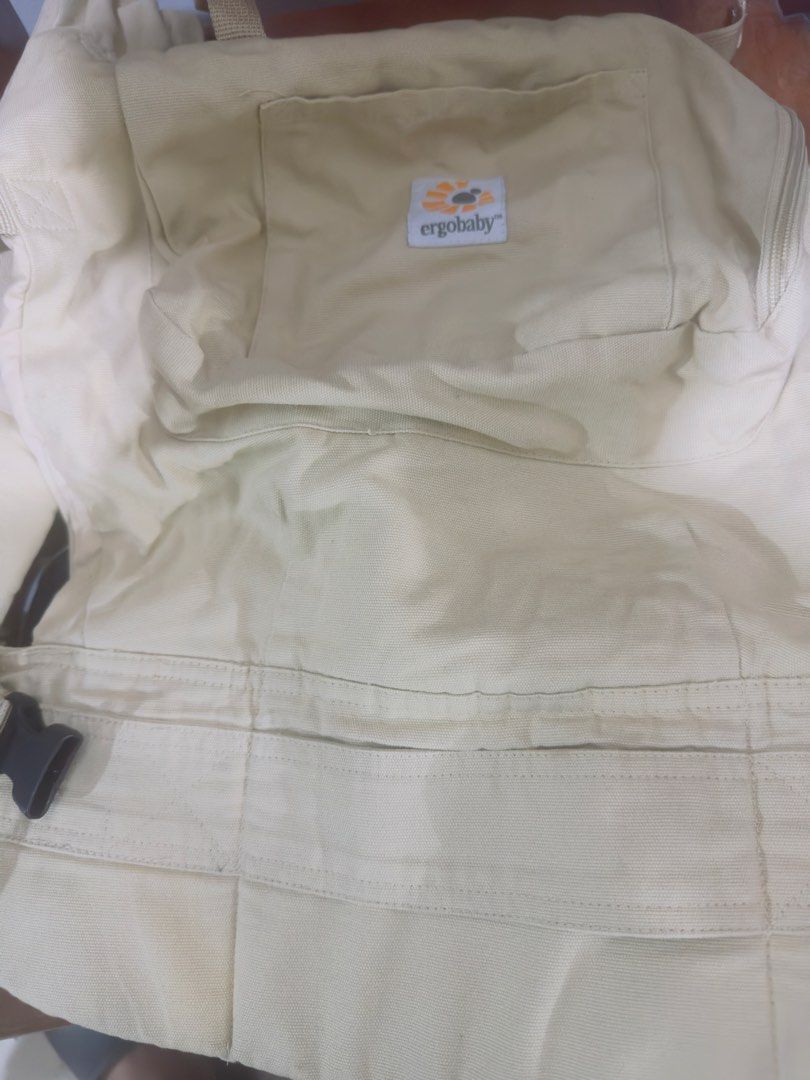 Ergobaby Baby Carrier Beige (Category: Carriers & Slings) located in Manila. Submitted by dredredredredre (Listing ID 1462572924, Image 1). Description: - Ergobaby carrier in a versatile neutral beige color. - Suitable for babies weighing between 7 lbs (3.2 kg) and 45 lbs (20 kg). - Features sturdy and secure buckles for peace of mind. Authentic Ergobaby Original Cotton Canvas Baby Carrier, bought in Japan. Great pre-owned condition, well maintai