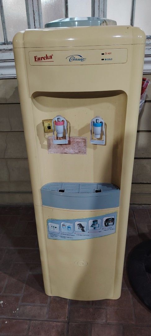 Eureka Classic Water Dispenser - Hot & Cold (Category: Water Purifiers & Dispensers) located in Manila. Submitted by elaleoj (Listing ID 1462531343, Image 1). Description: - Eureka Classic water dispenser - Features hot and cold water options - Color: Yellow - Drip tray included - Fully functional.