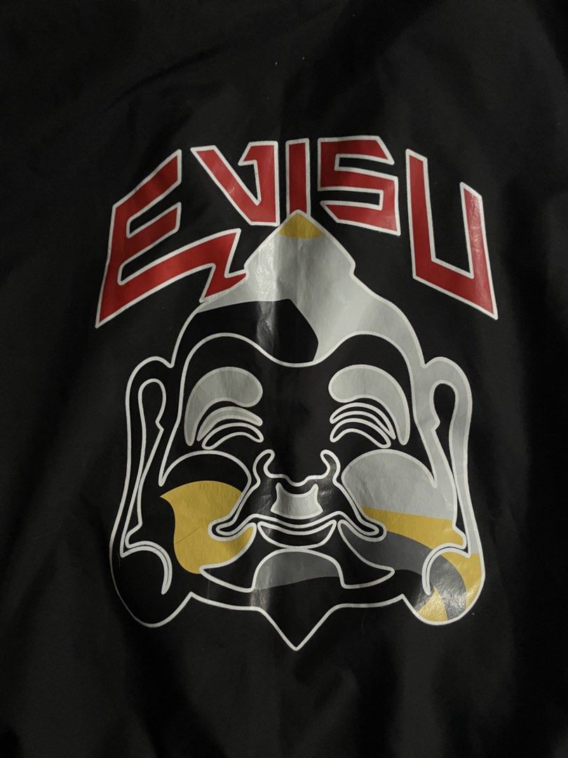 Evisu Big Buddha Logo Zip-up Bomber Jacket (Category: Coats, Jackets and Outerwear) located in Manila. Submitted by streetnattylituptown (Listing ID 1462501853, Image 2). Description: Evisu Big Buddha Logo Zip-up Bomber Jacket -Excellent Condition -Flawless -Boxy Fit -Need Wash Dimes: Length: 28 Width: 23 UNLI VC UNLI VOUCH CABUYAO LAGUNA DM IF INTERESTED .