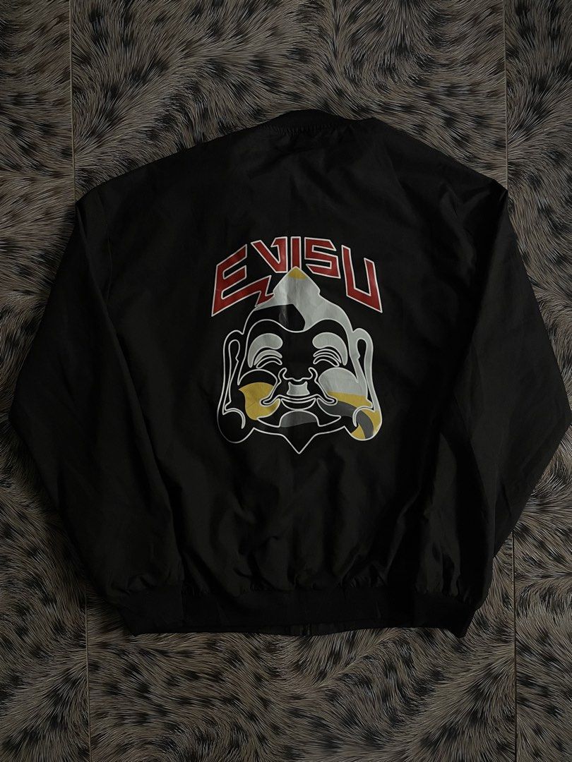 Evisu Big Buddha Logo Zip-up Bomber Jacket (Category: Coats, Jackets and Outerwear) located in Manila. Submitted by streetnattylituptown (Listing ID 1462501853, Image 1). Description: Evisu Big Buddha Logo Zip-up Bomber Jacket -Excellent Condition -Flawless -Boxy Fit -Need Wash Dimes: Length: 28 Width: 23 UNLI VC UNLI VOUCH CABUYAO LAGUNA DM IF INTERESTED .