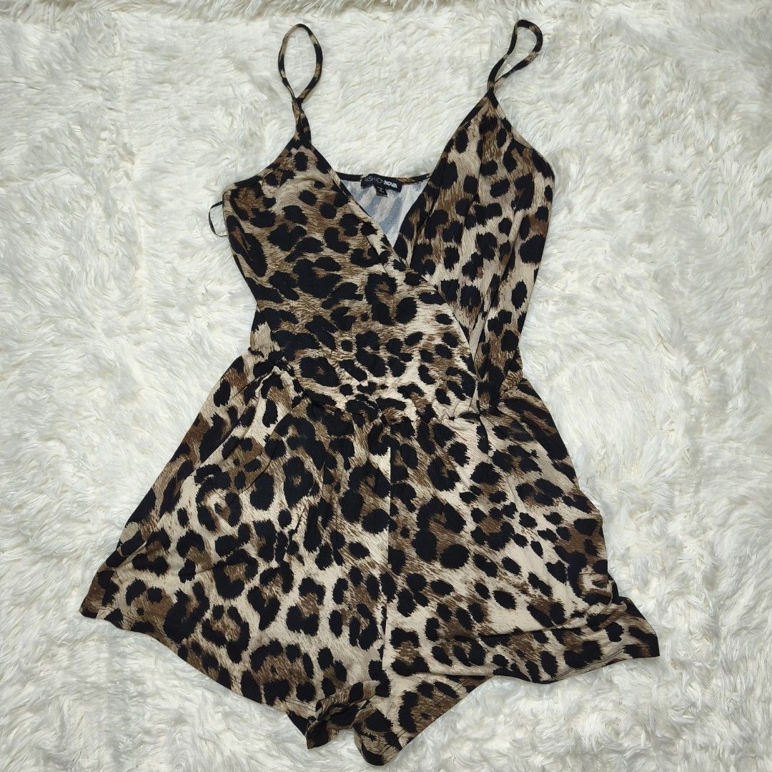 Fashion Nova Leopard Print Wrap Romper (Category: Rompers) located in Antipolo. Submitted by alphaomega_fox (Listing ID 1462573845, Image 1). Description: - Cute leopard print romper from Fashion Nova - Wrap front design with delicate spaghetti straps - Comfortable elasticated waist for a perfect fit - Versatile for a night out or casual wear - Lightweight and easy to style stretchable 13x23 200 plus sf.
