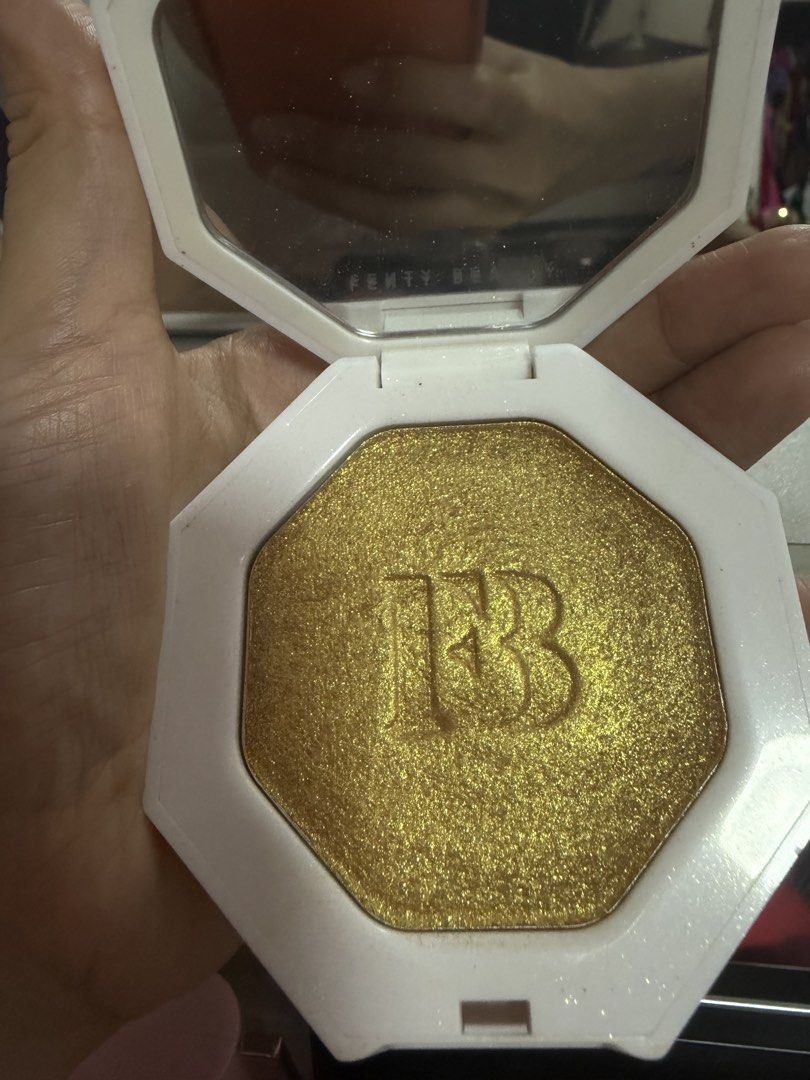 Fenty Beauty Trophy Wife highlighter (Category: Makeup) located in Paranaque City. Submitted by wakeupnmakeup.ph (Listing ID 1462650751, Image 1). Description: With box.