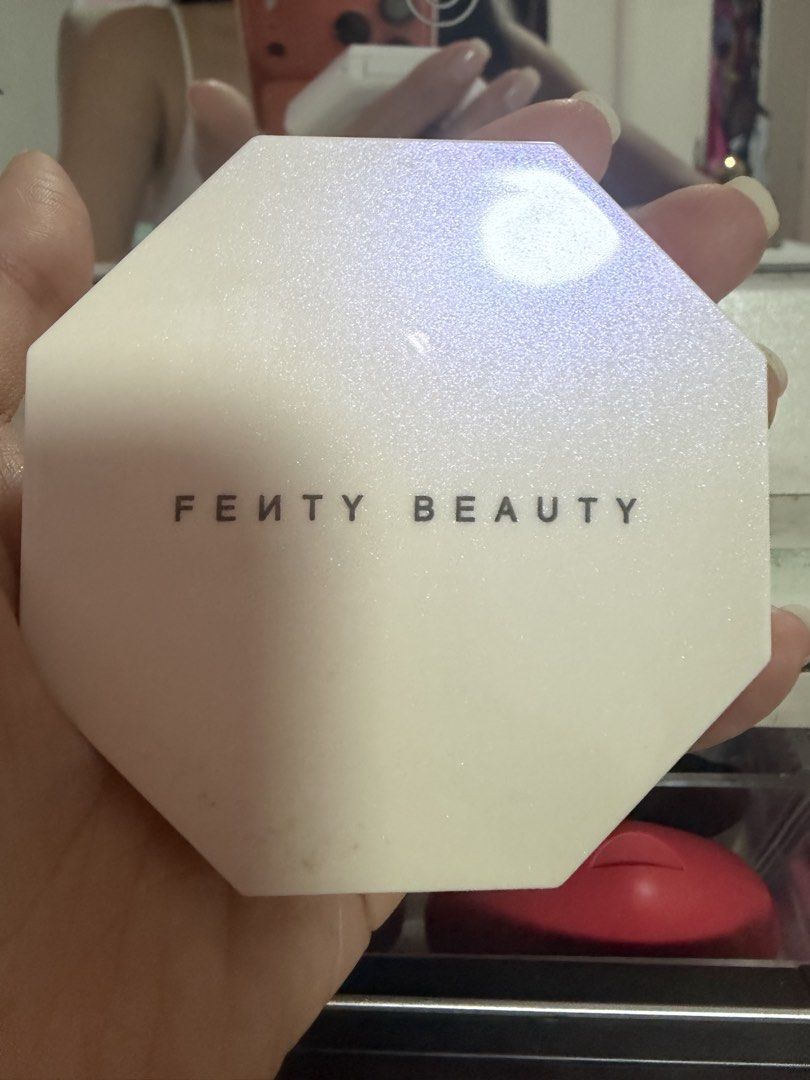 Fenty Beauty Trophy Wife highlighter (Category: Makeup) located in Paranaque City. Submitted by wakeupnmakeup.ph (Listing ID 1462650751, Image 2). Description: With box.