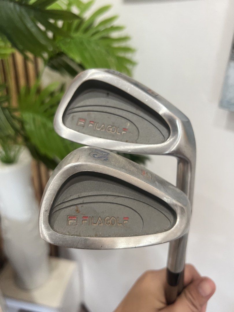 Fila Golf Irons - P/S and 6 Iron (Category: Golf) located in Manila. Submitted by livefish.26c802 (Listing ID 1462455494, Image 1). Description: - Set includes Fila Golf P/S wedge and 6 iron. - Features Fila Golf Equipment shafts. - Ideal for beginner golfers. - Great for adding to an existing golf set. - Feel free to ask any questions..