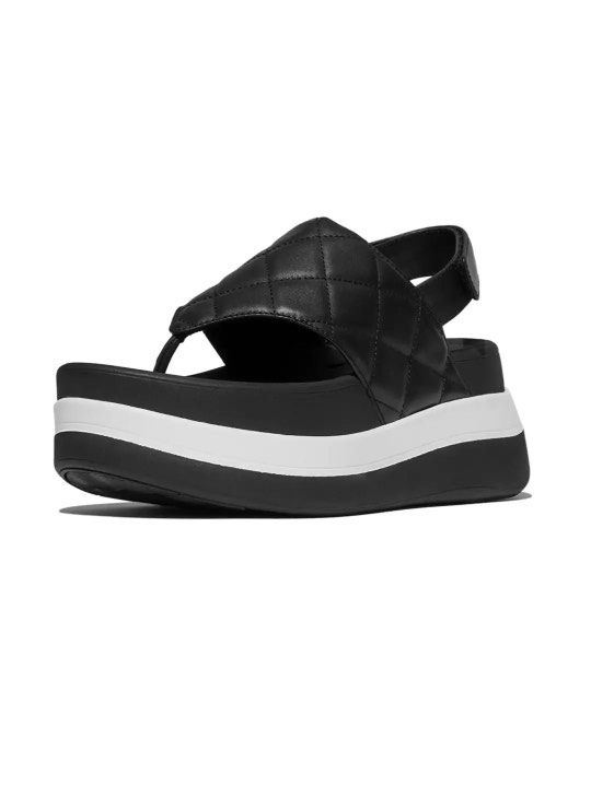 FitFlop F-Mode Stack Black Quilted Platform Thong Sandals (Category: Flats & Sandals) located in Paranaque City. Submitted by declutter_therapy (Listing ID 1462605966, Image 1). Description: - Brand: FitFlop - Worn inside the house once - Style: Black quilted platform thong sandals - Features: Adjustable ankle strap, comfortable platform sole with white stripe detail - Perfect for: Casual wear - Includes: Original box - US 8, UK 6, EU 39 - Origin