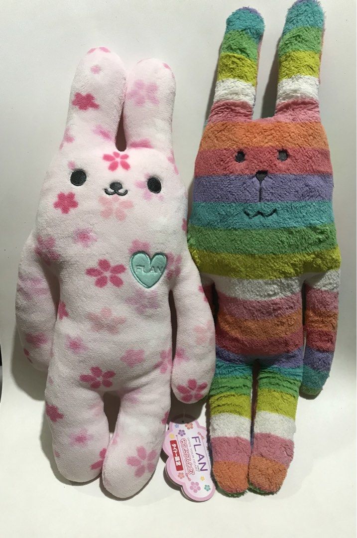 Flan pink 48cm, craftholic stripes 56cm (Category: Plushies & Soft Toys) located in Cainta. Submitted by janilen (Listing ID 1462556563, Image 1). Description: Pink with tag 48 cm 350 Stripes 56 cm 200.
