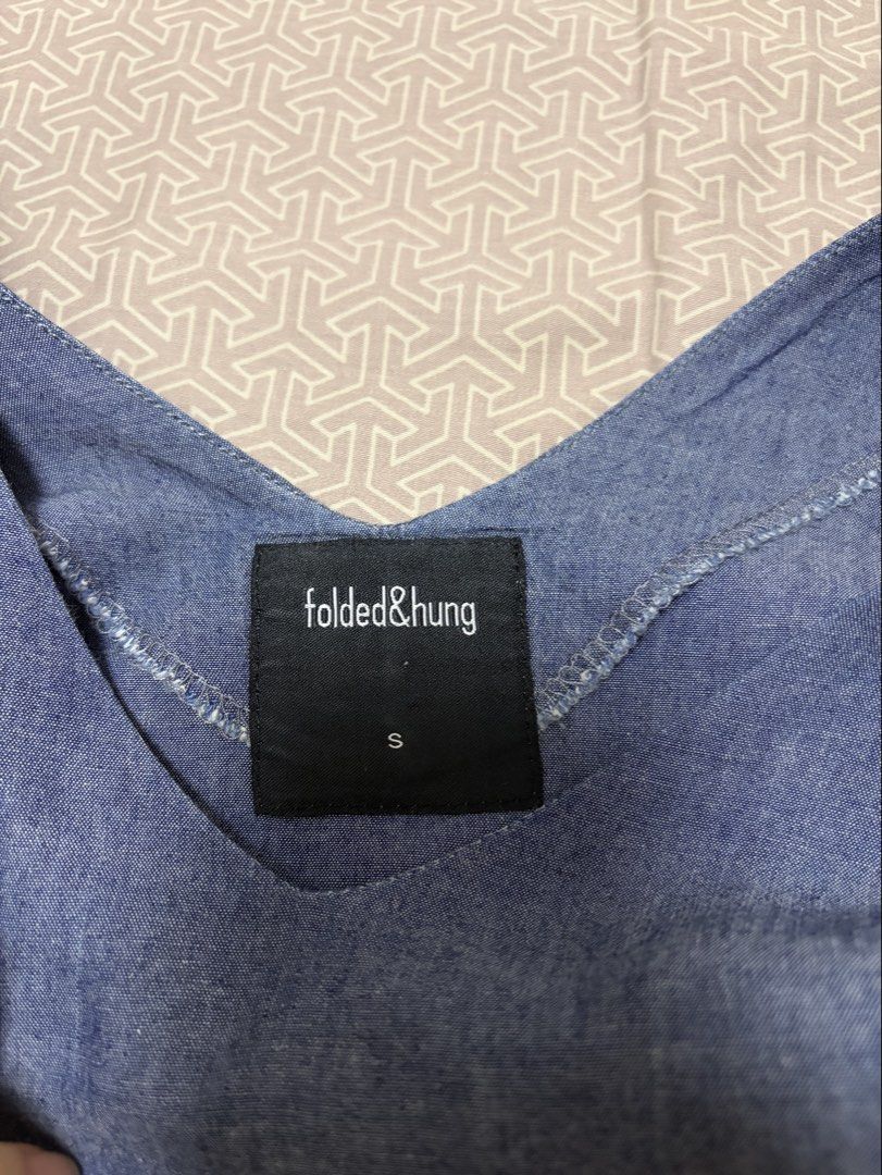 Folded & Hung Blue Cold Shoulder V-Neck Top Size S (Category: Blouses) located in Manila. Submitted by shopmeph (Listing ID 1462650311, Image 2). Description: - Brand: Folded & Hung - Color: Blue - Style: Cold shoulder top - Neckline: V-neck - Sleeves: Short sleeves with button details - Size: S - Occasion: Casual wear.