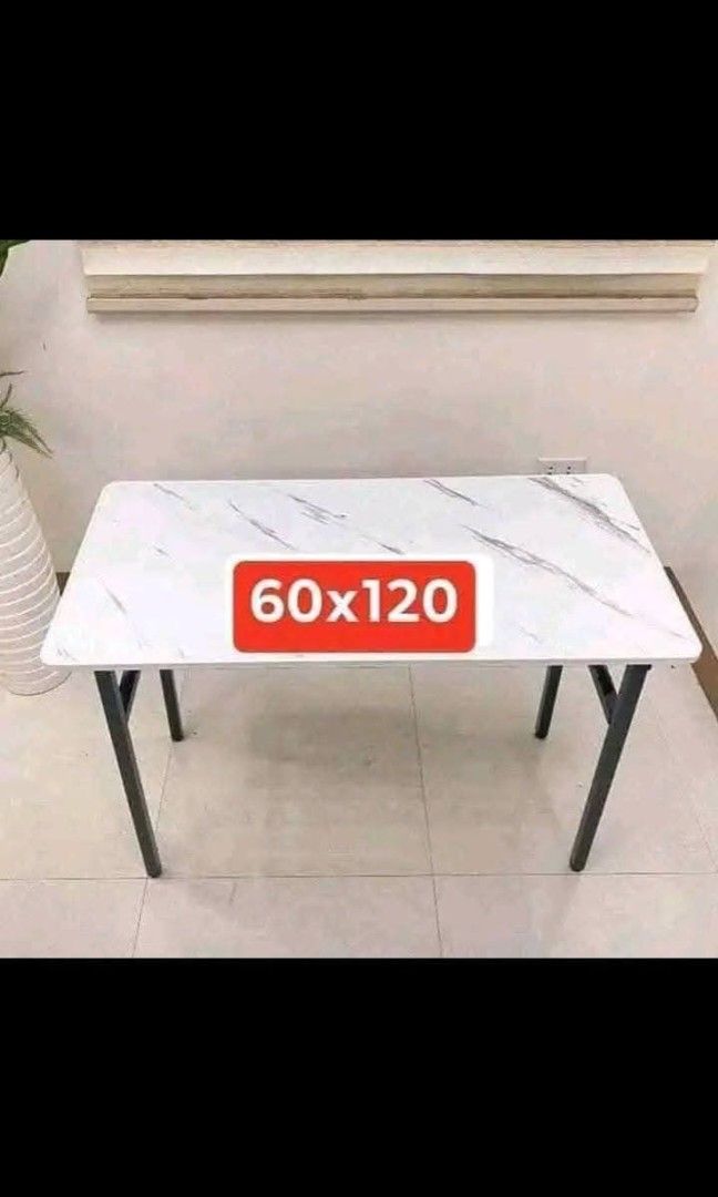 Folding table (Category: Tables & Sets) located in Manila. Submitted by nixdcruz (Listing ID 1462620416, Image 1). Description: folding table marble designs.