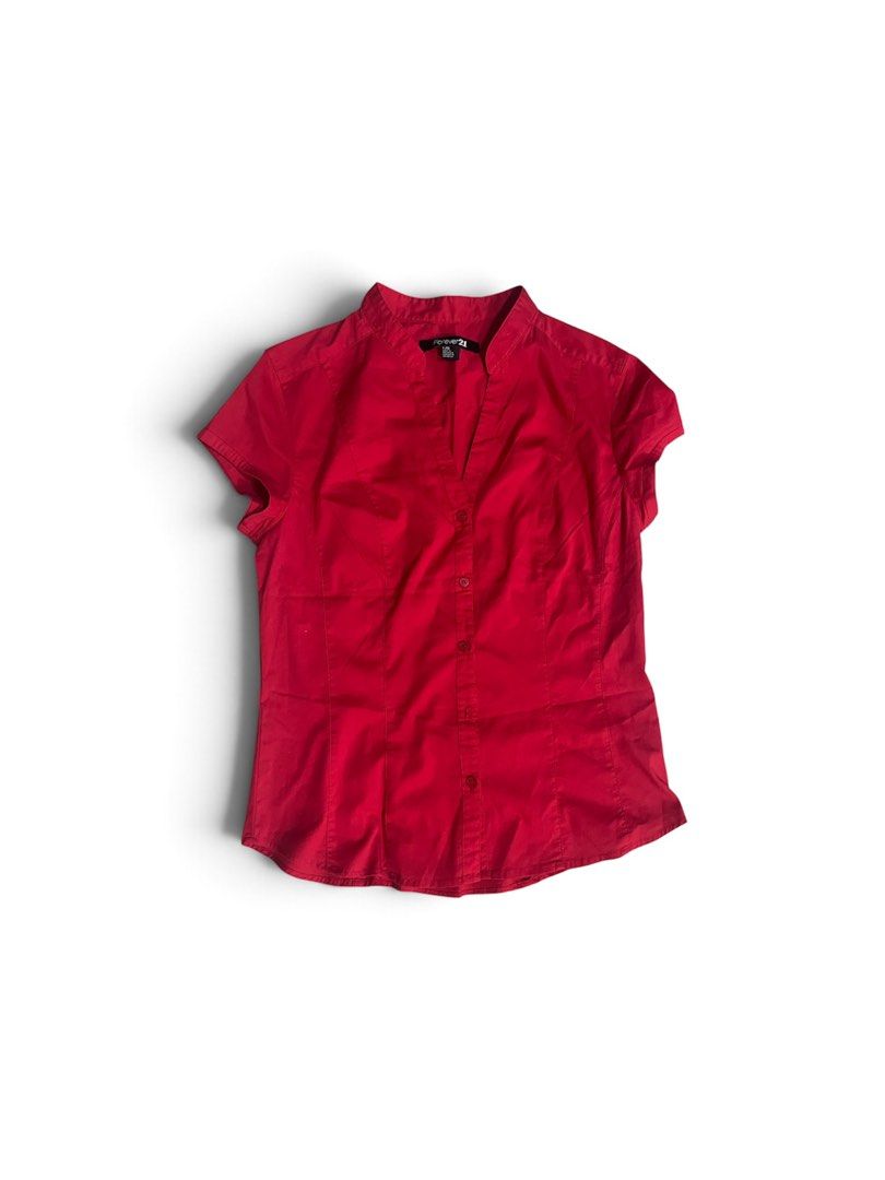 Forever 21 Red Short Sleeve Button-Up Shirt (Category: Shirts) located in Valenzuela. Submitted by _tann17 (Listing ID 1462516806, Image 1). Description: - Red short sleeve shirt from Forever 21 - Collared neckline with button-up front - Cotton blend fabric - Fitted style - Versatile for work or casual outfits.