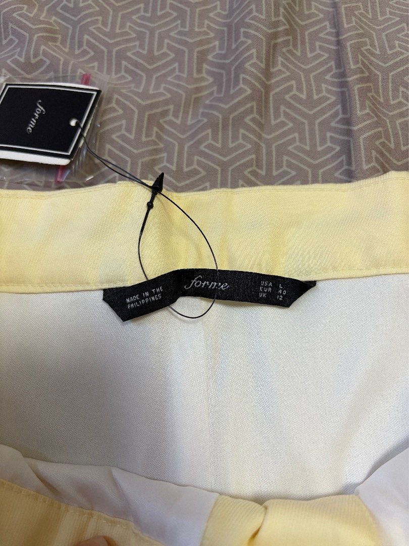 Forme Yellow Belted Shorts (Category: Shorts) located in Manila. Submitted by shopmeph (Listing ID 1462651303, Image 2). Description: - Brand new yellow shorts from Forme - Made in the Philippines - Features a buckle belt detail at the waist - Tag still attached.