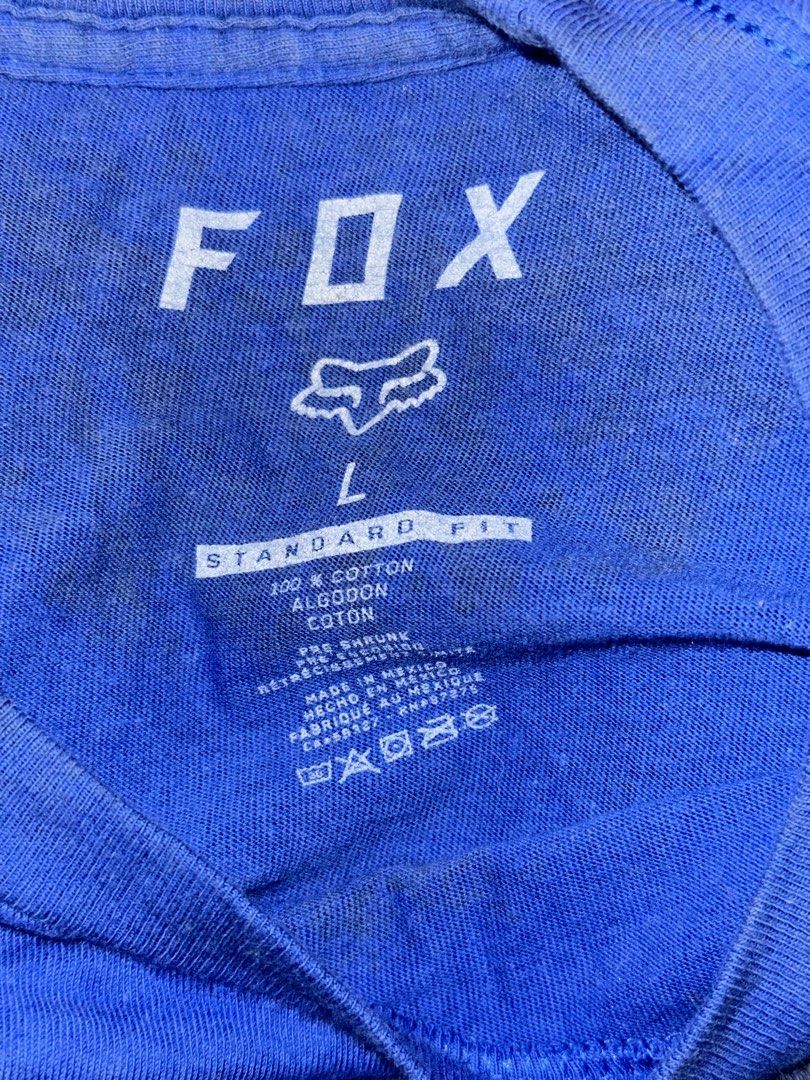 Fox Racing Blue T-Shirt Size L (Category: Tshirts & Polo Shirts ) located in Quezon City. Submitted by mancave_stuff (Listing ID 1462520473, Image 2). Description: - Blue Fox Racing T-shirt - Standard Fit, Size L (21 x 27) - 100% Cotton - Iconic Fox head logo on front - Perfect for casual wear or riding - Minor marks on fabric (please check photos).
