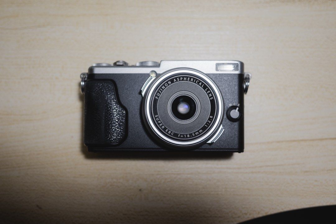 Fujifilm X70 Premium APS-C Compact Camera (Category: Cameras) located in Bocaue. Submitted by jidccruz (Listing ID 1462477542, Image 1). Description: For Sale / Trade Fujifilm X70 Silver Argent - APS-C sized sensor - Built-in flash - Fixed 18.5mm (28mm full frame equivalent lens) - Truly pocketable - Good alternative to Nikon Coolpix A DX or Ricoh GR In good condition! Functionality: 9/10 - date reset when changing batteries Sensor: 9.5/10 - smal