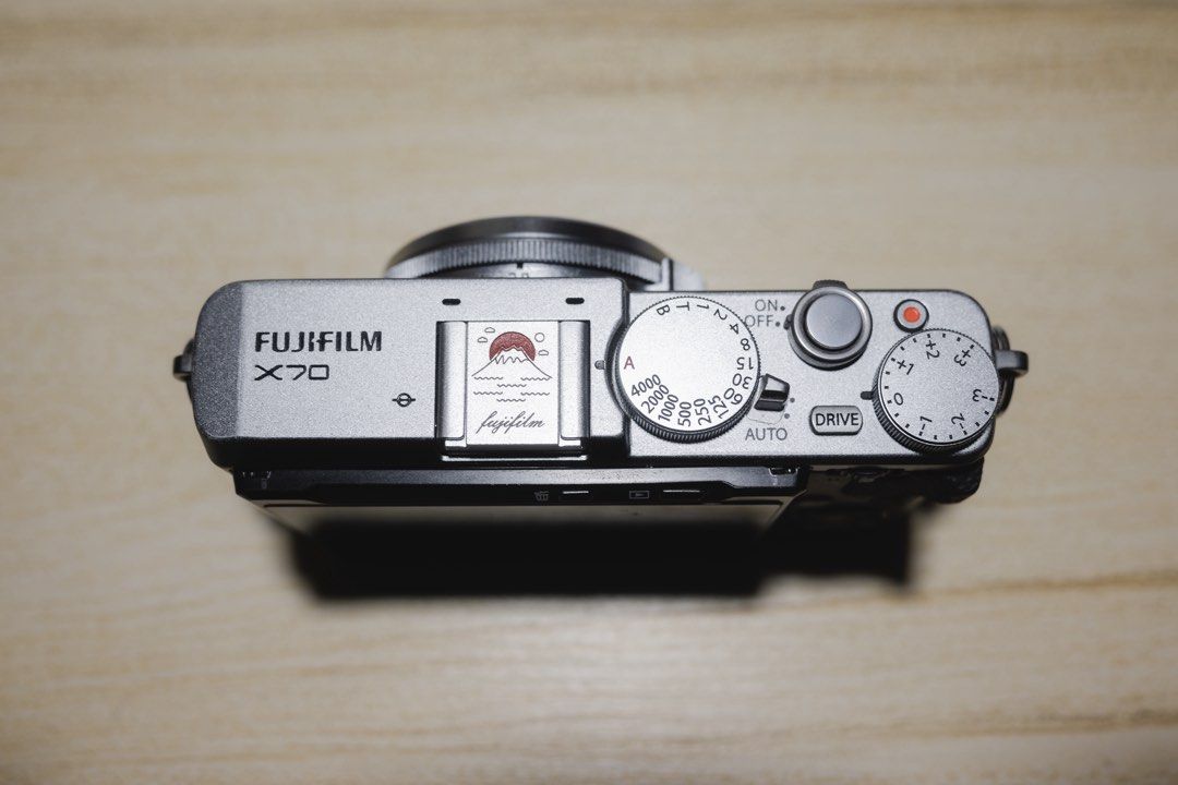 Fujifilm X70 Premium APS-C Compact Camera (Category: Cameras) located in Bocaue. Submitted by jidccruz (Listing ID 1462477542, Image 3). Description: For Sale / Trade Fujifilm X70 Silver Argent - APS-C sized sensor - Built-in flash - Fixed 18.5mm (28mm full frame equivalent lens) - Truly pocketable - Good alternative to Nikon Coolpix A DX or Ricoh GR In good condition! Functionality: 9/10 - date reset when changing batteries Sensor: 9.5/10 - smal