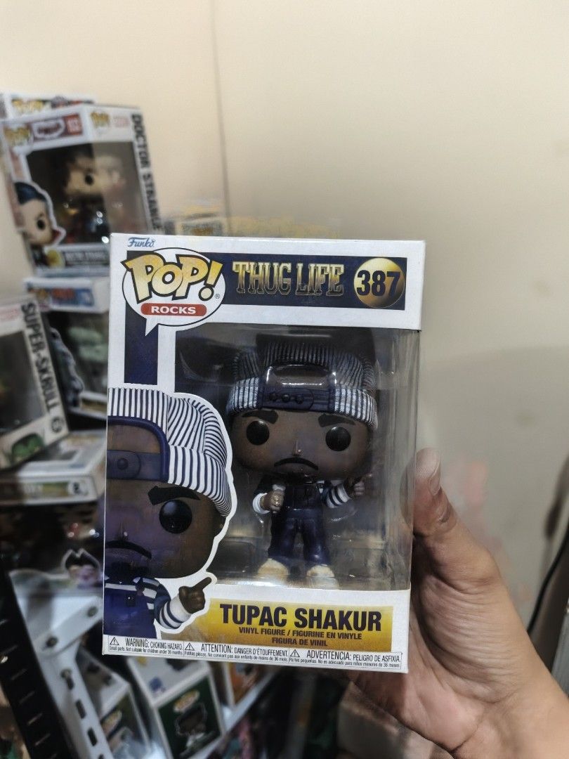 Funko Pop! Rocks Tupac Shakur 387 (Category: Designer & Blind Box Toys) located in Antipolo. Submitted by kingofpaps (Listing ID 1462588004, Image 1). Description: - Funko Pop! Rocks: Tupac Shakur - Thug Life Series, Model #387 - Brand New & Sealed Vinyl Figure - Iconic Hip-Hop & Pop Culture Collectible - Must-have for fans!.