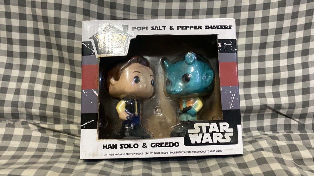 Funko Pop! Salt and Pepper Shakers (Category: Designer & Blind Box Toys) located in Pasig City. Submitted by pollyyesterr (Listing ID 1462453465, Image 1). Description: - Funko Pop! Star Wars Salt and Pepper Shakers - Features Han Solo and Greedo designs - Brand new, still in original packaging - Ideal for Star Wars collectors and kitchen enthusiasts - Adds a touch of galactic flair to your dining table.