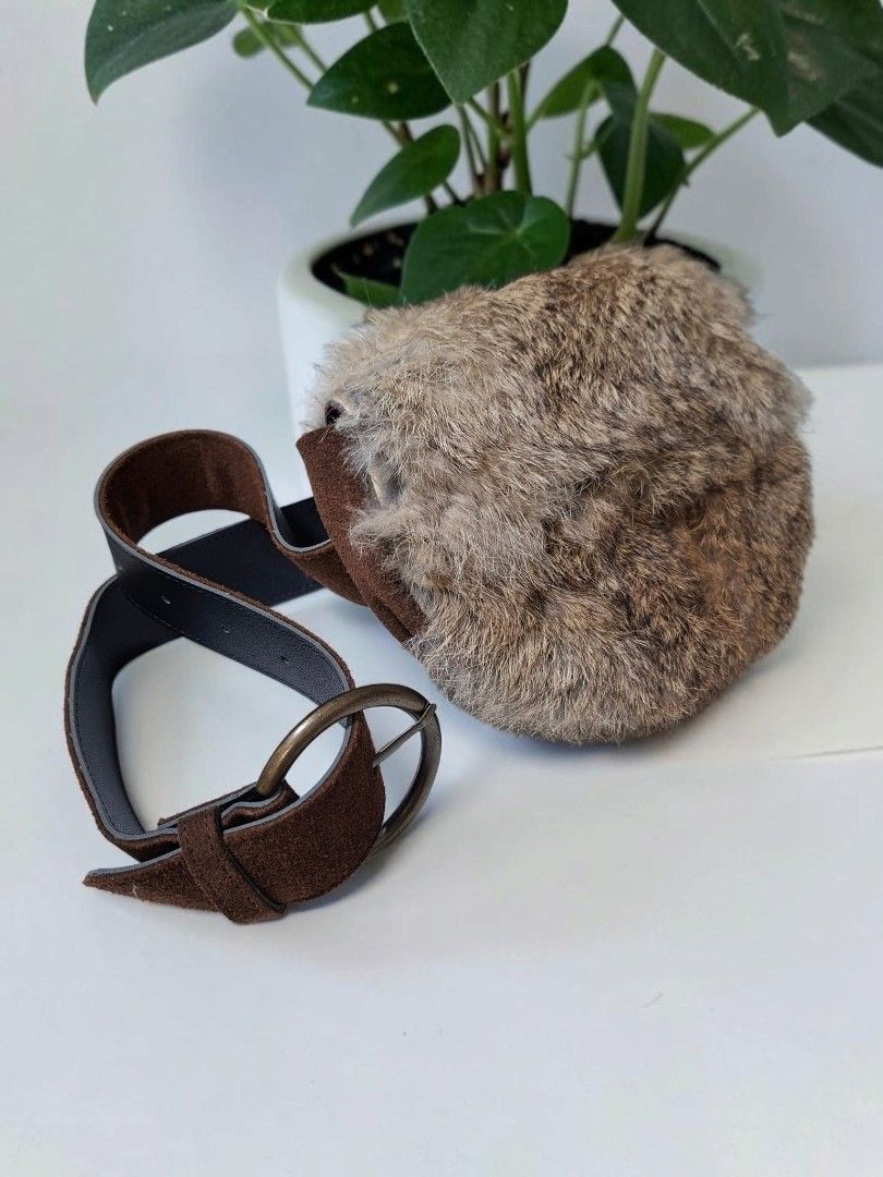 FUR LEATHER BELT BAG (Category: Cross-body Bags) located in Las Pinas. Submitted by annachiaonair2037 (Listing ID 1462632054, Image 3). Description: FUR LEATHER BELT BAG FROM JAPAN BELT IS GENUINE LEATHER UPTO 32" FLAP OPEN SNAP BUTTON CLOSURE H 5.5" L 6" W2".