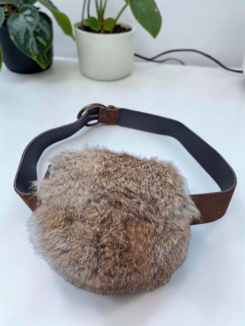 FUR LEATHER BELT BAG (Category: Cross-body Bags) located in Las Pinas. Submitted by annachiaonair2037 (Listing ID 1462632054, Image 2). Description: FUR LEATHER BELT BAG FROM JAPAN BELT IS GENUINE LEATHER UPTO 32" FLAP OPEN SNAP BUTTON CLOSURE H 5.5" L 6" W2".
